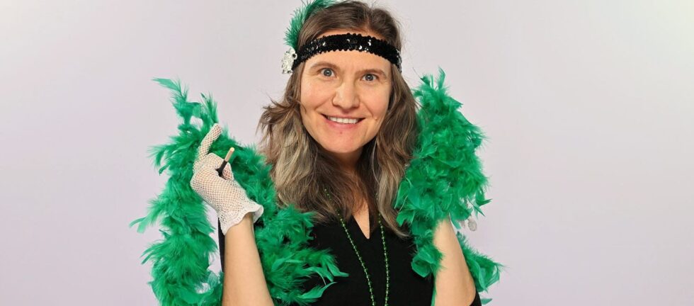 Lady dressed up with Gatsby props